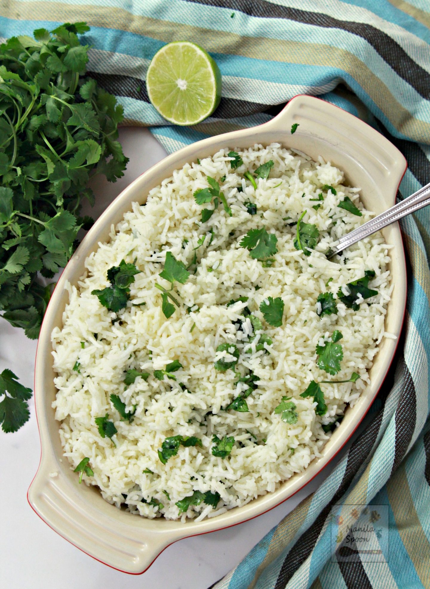  A combination of citrus juices make this Cilantro Lime Rice so tasty without being too tangy - so perfectly balanced. Everyone loves this and it's one of my oft-requested recipes! Easy to make, too!! #cilantro #lime #rice #cilantrolimerice