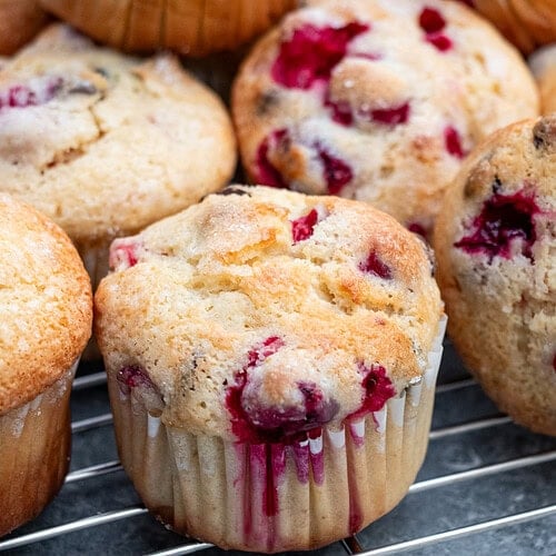 Moist, delicious, and bursting with flavor, these Cranberry Chocolate Banana Muffins are a hit wherever you bring them! Made with fresh, frozen, or dried cranberries, they’re perfect for a cozy fall or winter breakfast or a sweet snack treat.