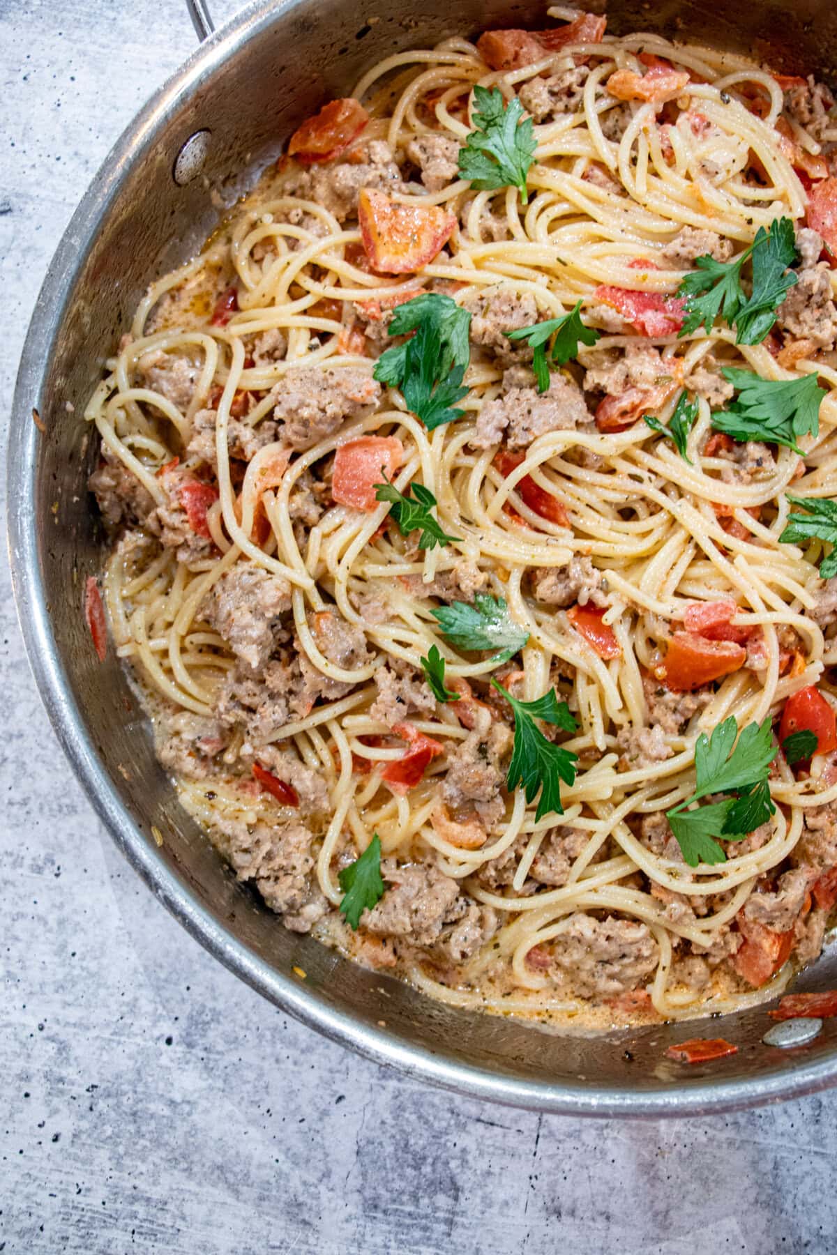 We make this Pasta with Italian sausage and creamy tomato sauce all the time as it's an easy and NO FAIL delicious recipe! Enjoy! Pasta with Italian sausage in creamy tomato sauce