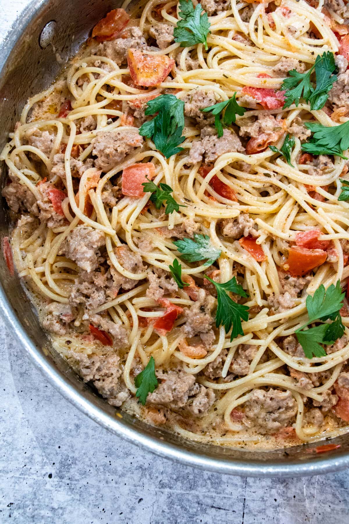 We make this Pasta with Italian sausage and creamy tomato sauce all the time as it's an easy and NO FAIL delicious recipe! Enjoy! Pasta with Italian sausage in creamy tomato sauce in large sauce pan