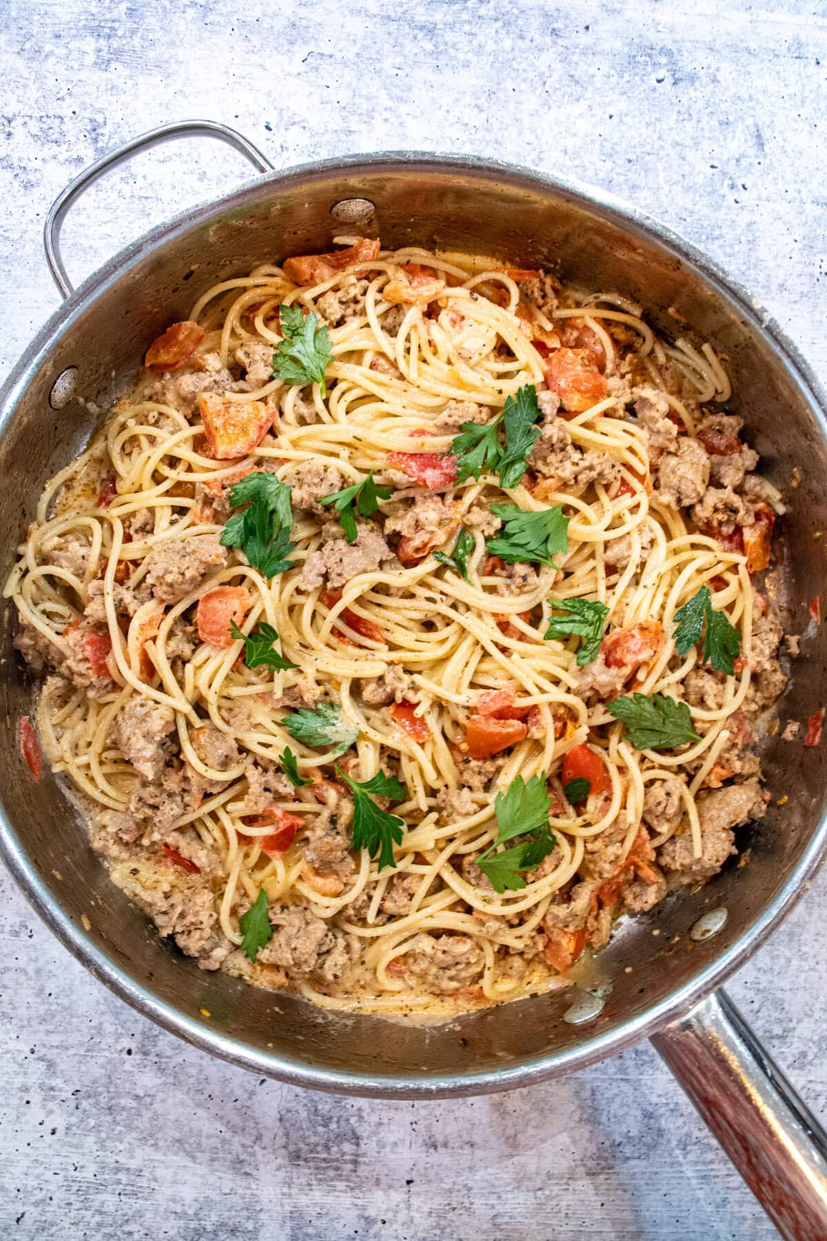 We make this Pasta with Italian sausage and creamy tomato sauce all the time as it's an easy and NO FAIL delicious recipe! Enjoy! Pasta with Italian sausage in creamy tomato sauce