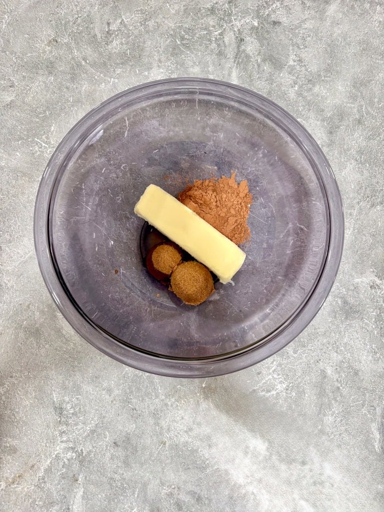 Microwave or melt the butter, sugar, cocoa, and vanilla over low heat.