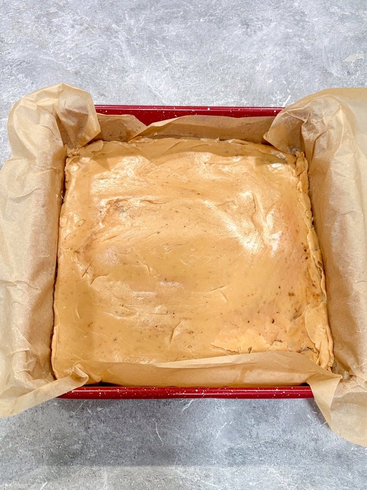 Pour caramel immediately over the chilled crust and spread evenly.