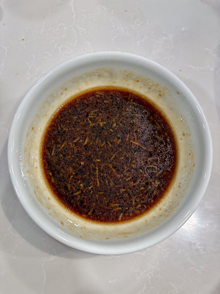 Soy sauce mix with brown sugar, sesame oil, and freshly grated ginger.