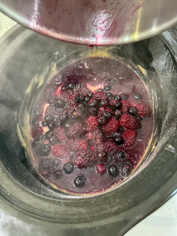 Once it boils, remove from the heat and immediately pour over the batter.