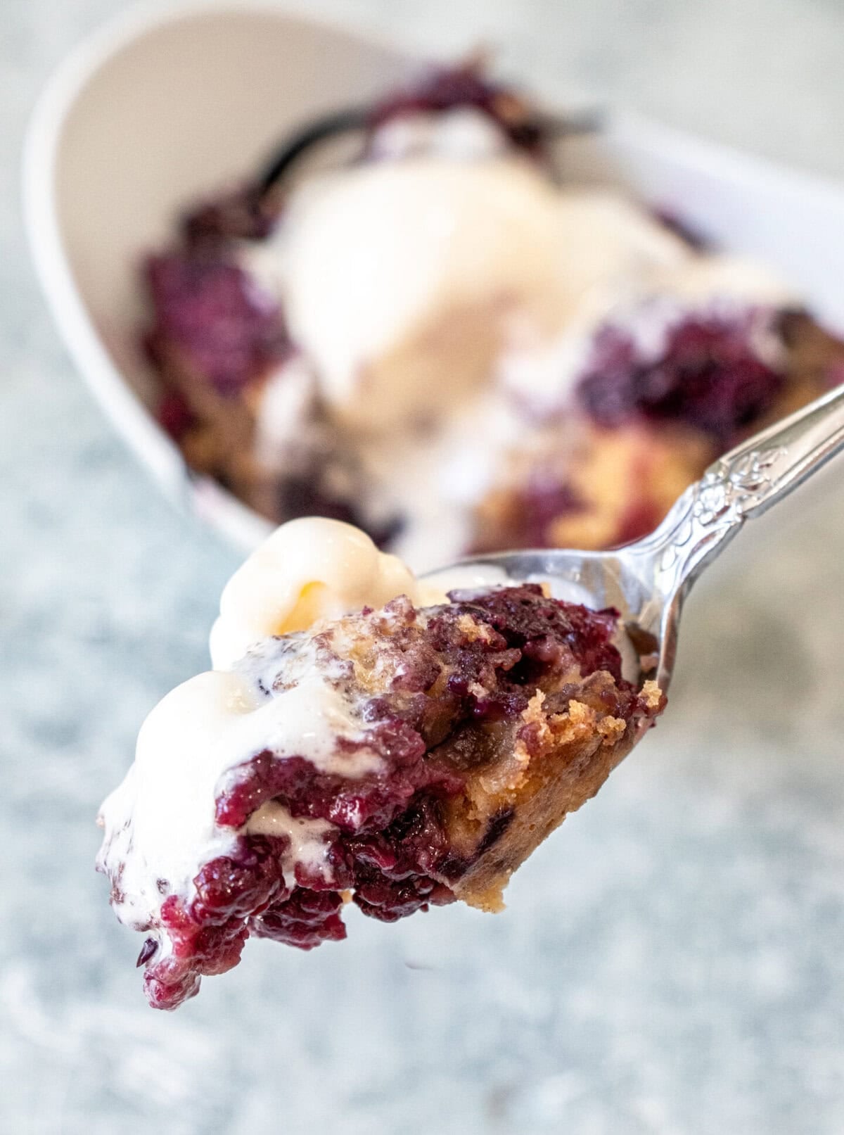 Slow Cooker Blackberry Cobbler with juicy berries and warmly spiced cake topping.