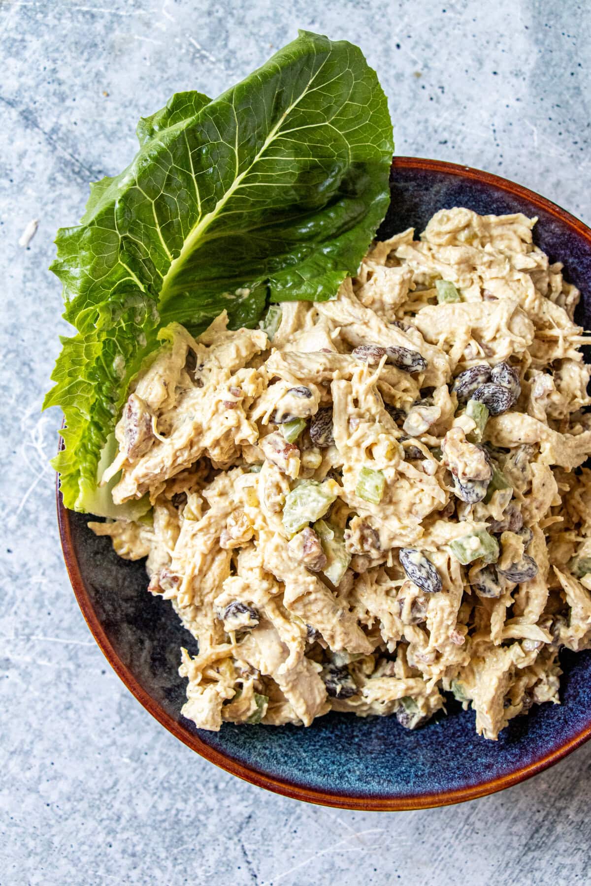 This chicken salad comes together so quickly. Seasoned with curry powder and chutney and mixed in with fruits and nuts, too it is so deliciously good! This chicken salad comes together so quickly. Seasoned with curry powder and chutney and mixed with fruit and nuts, it is so delicious!