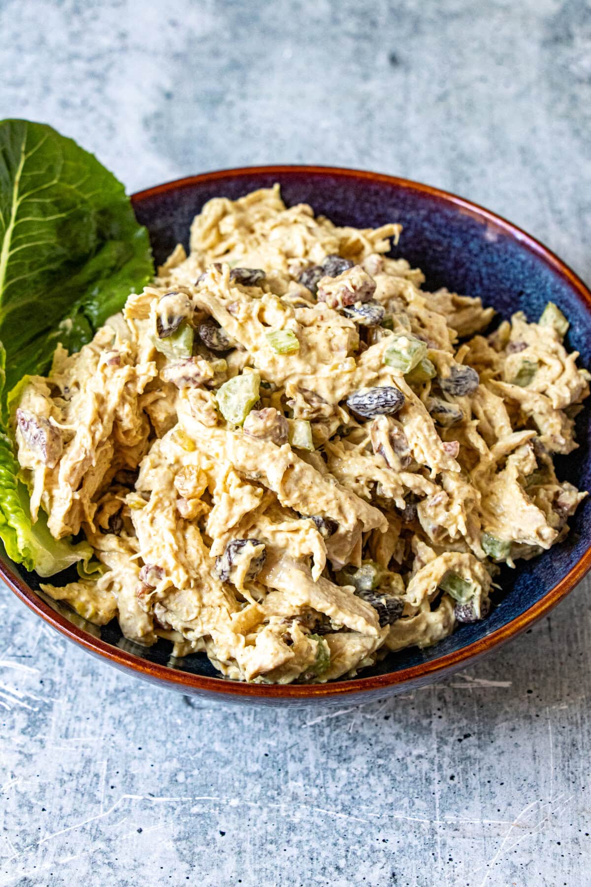 This chicken salad comes together so quickly. Seasoned with curry powder and chutney and mixed with fruit and nuts, it is so delicious!