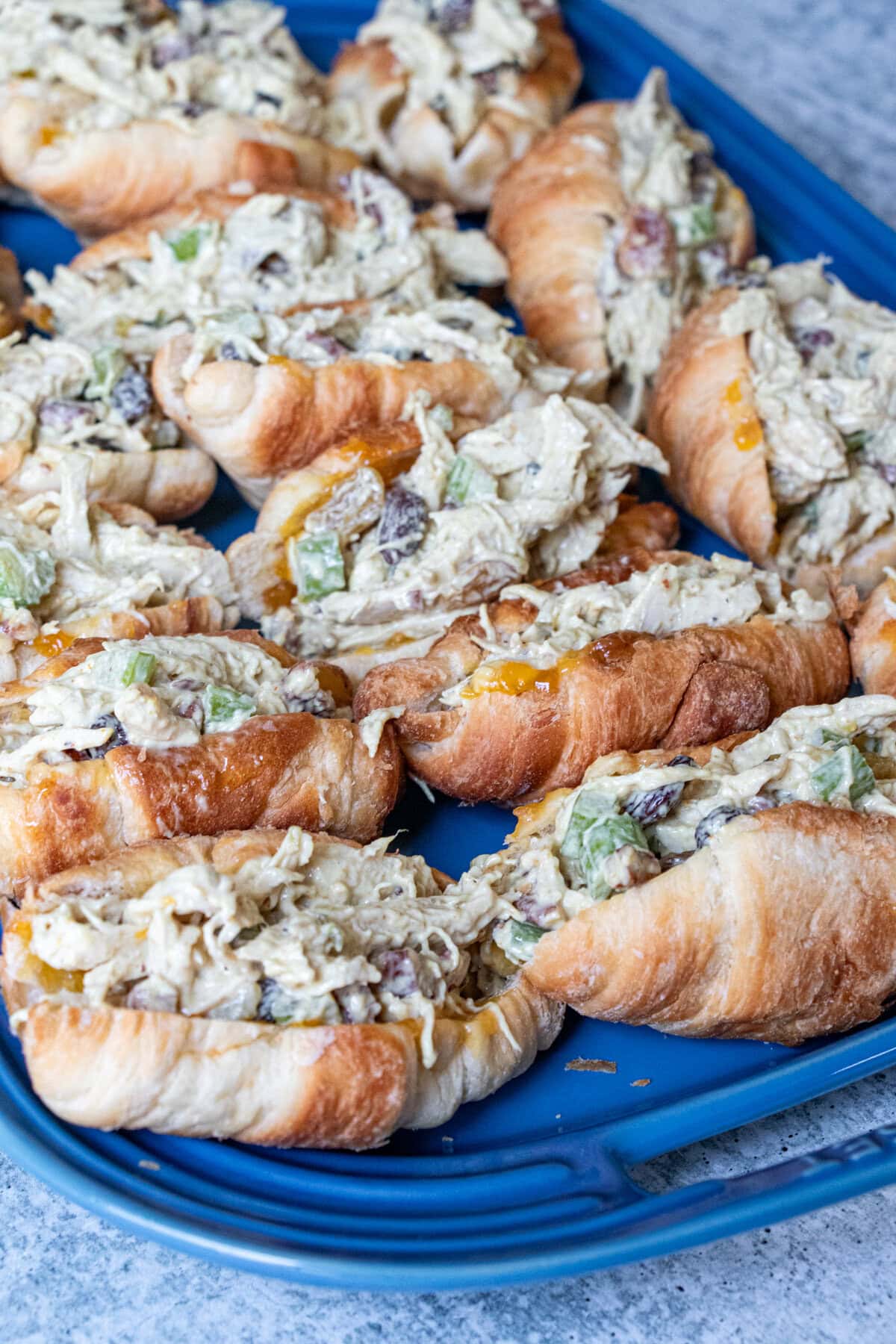 This chicken salad comes together so quickly. Seasoned with curry powder and chutney and mixed in with fruits and nuts, too it is so deliciously good! This chicken salad comes together so quickly. Seasoned with curry powder and chutney and mixed with fruit and nuts, it is so delicious!
