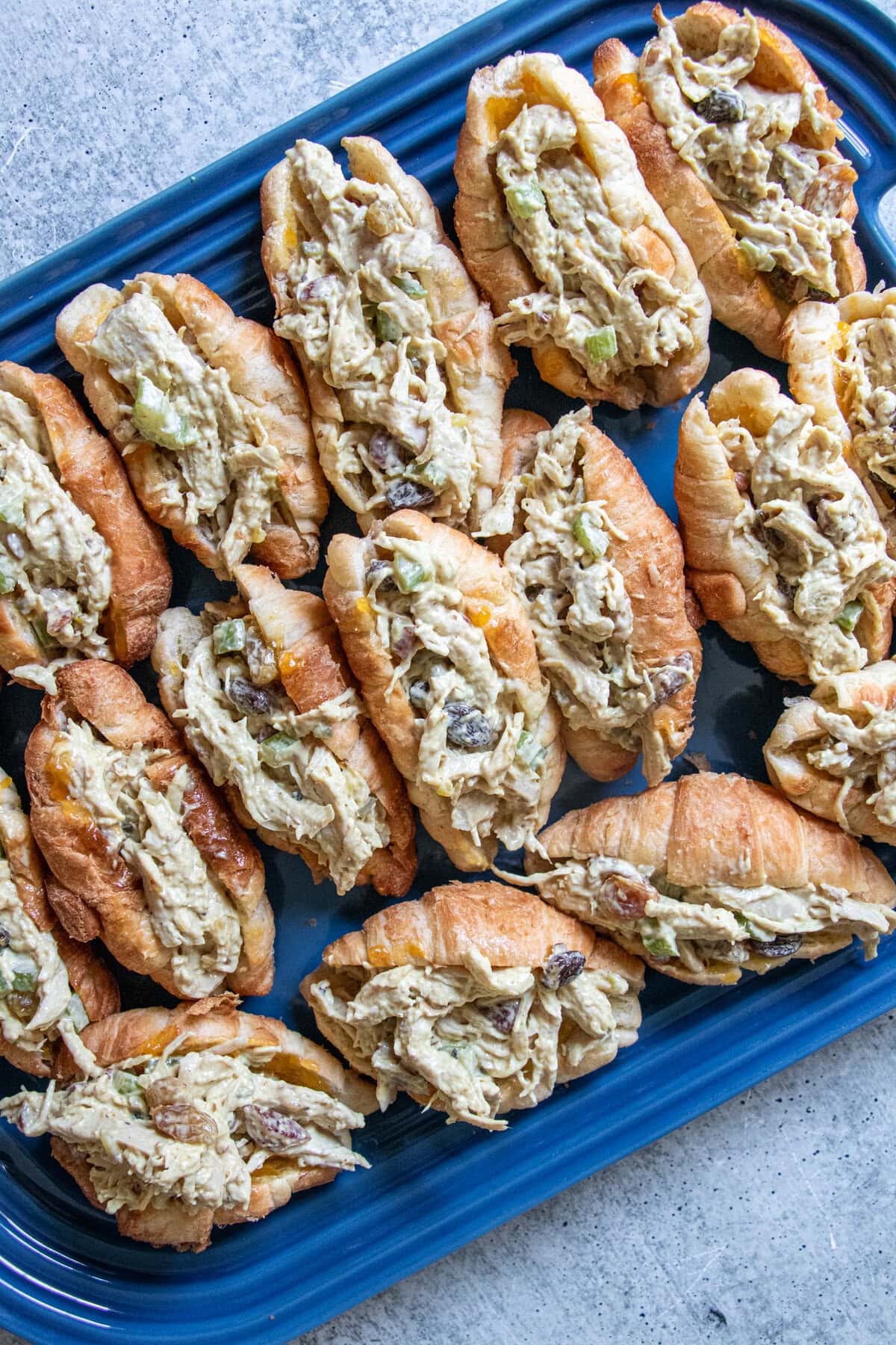 This chicken salad comes together so quickly. Seasoned with curry powder and chutney and mixed with fruit and nuts, it is so delicious!