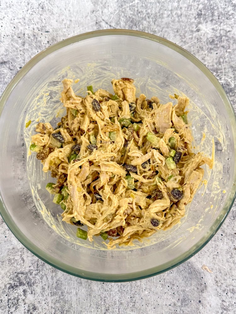 This chicken salad comes together so quickly. Seasoned with curry powder and chutney and mixed with fruit and nuts, it is so delicious!