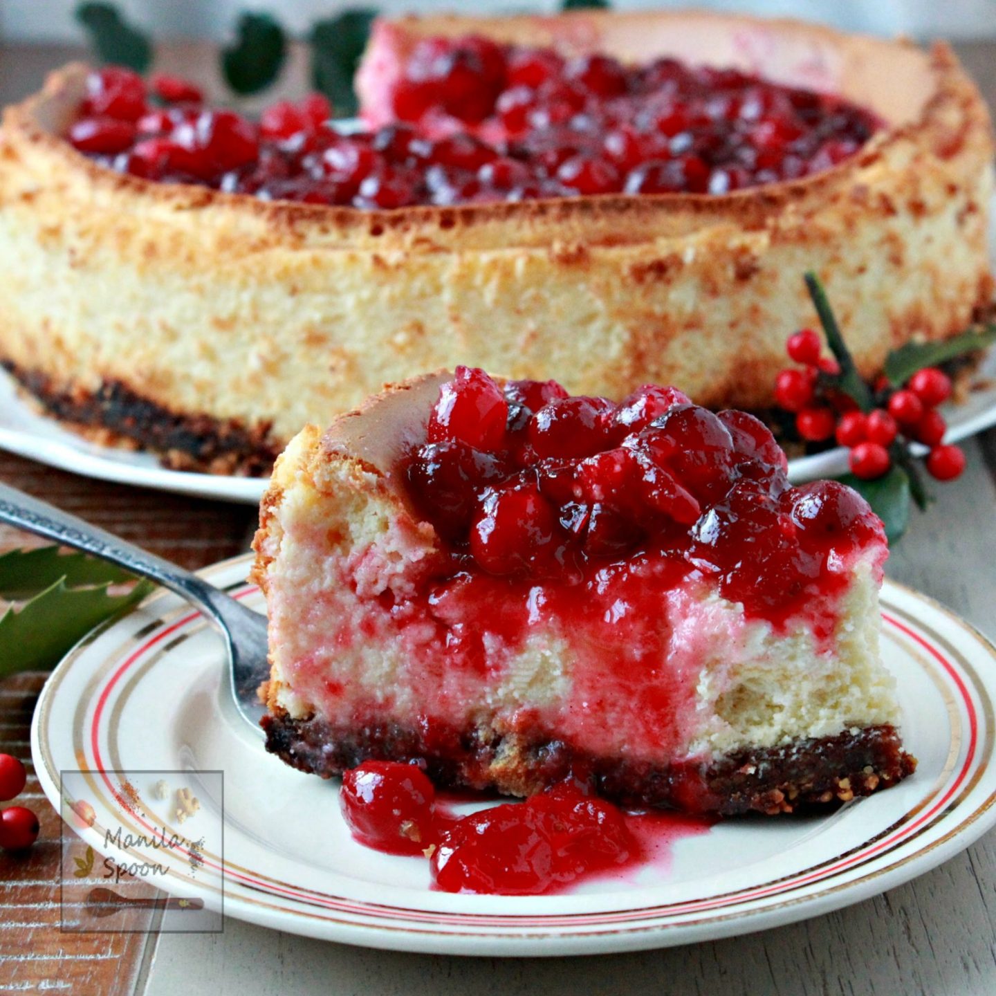 A deliciously creamy holiday cheesecake topped with a luscious sweet-tangy and perfectly spiced cranberry sauce. It is completely gluten-free so it's perfect for those on a wheat-free diet!