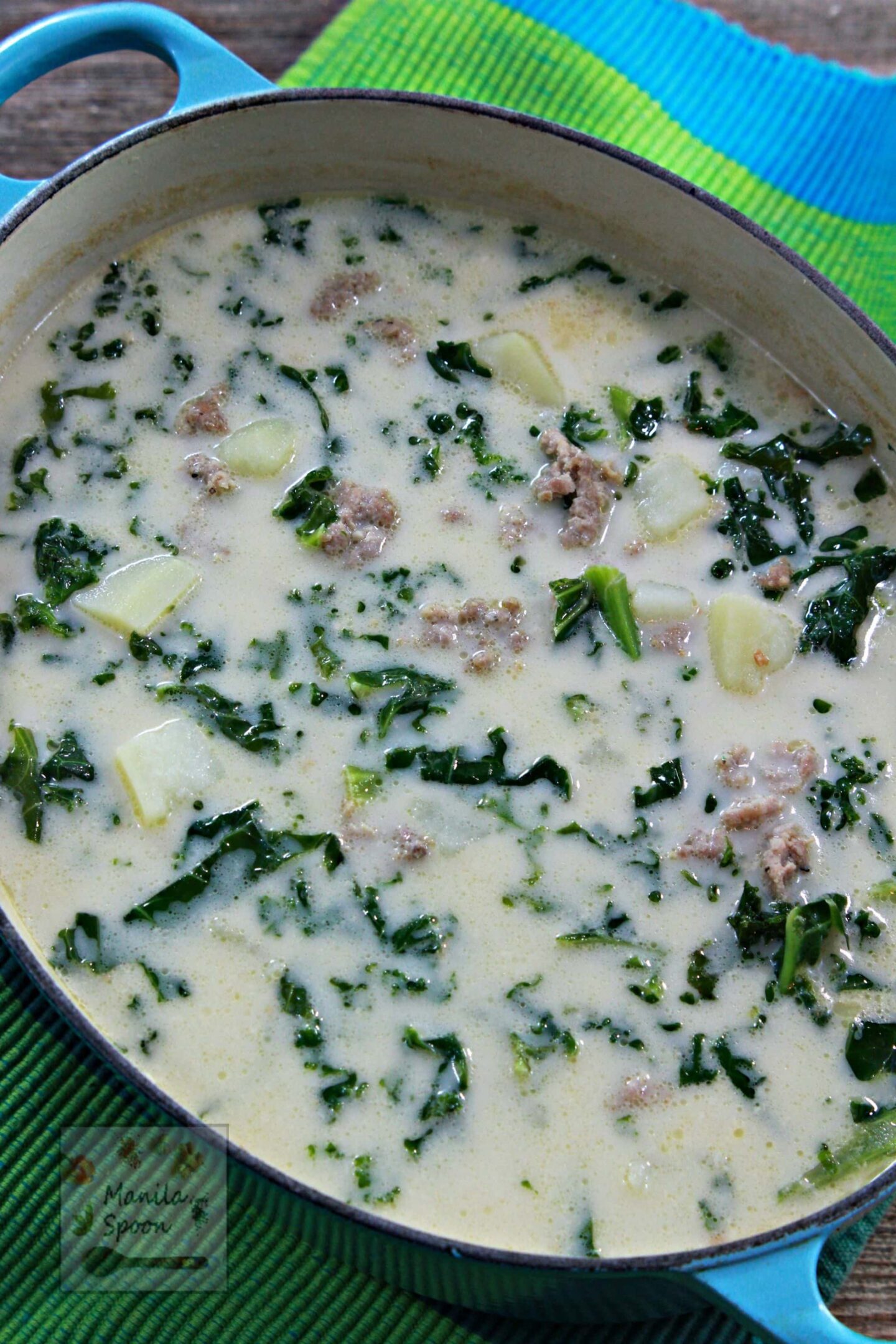 The perfect antidote for fall and winter chilly nights, a hot bowl of tasty and hearty Tuscan Sausage Potato Soup. Creamy and perfectly seasoned,  it's true comfort food in a bowl!