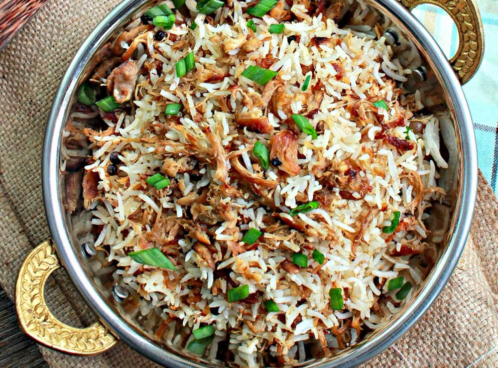 This Filipino Adobo Fried Rice is the best way to use up leftover chicken or pork adobo! Loaded with savory adobo flavor and garlicky goodness, this easy fried rice is a quick, hearty meal perfect for breakfast, lunch, or dinner. Simple, delicious, and packed with Filipino comfort food flavor!