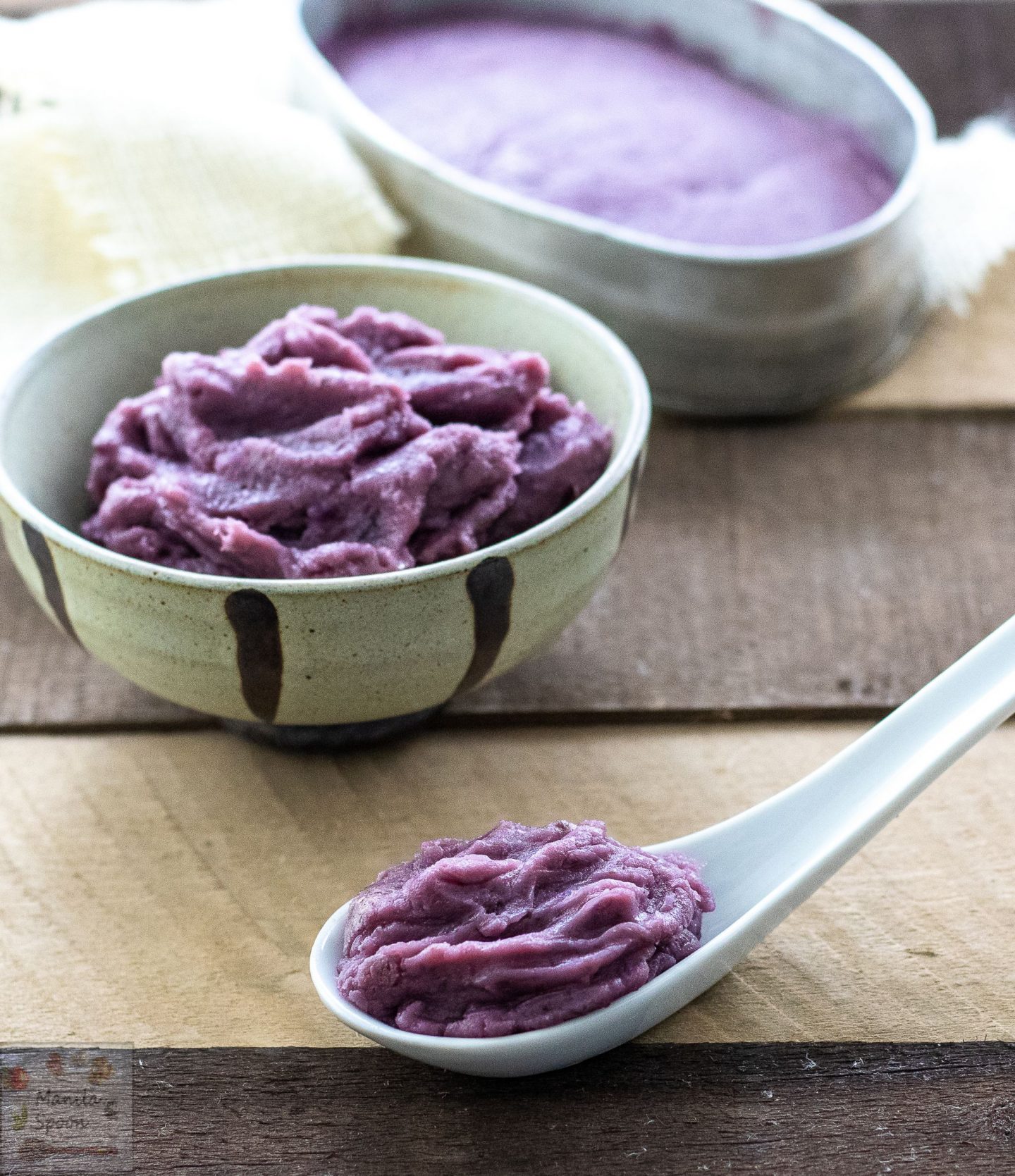This Filipino purple yam dessert (ube halaya or ube jam) is not only eye-catching, it's totally delicious!! Mashed purple yam is cooked slowly with butter, evaporated milk and condensed milk which give this colorful dessert such a luscious buttery, creamy and sweet flavor. Great on its own or as topping for halo-halo or as jam for bread or filling for pastries.