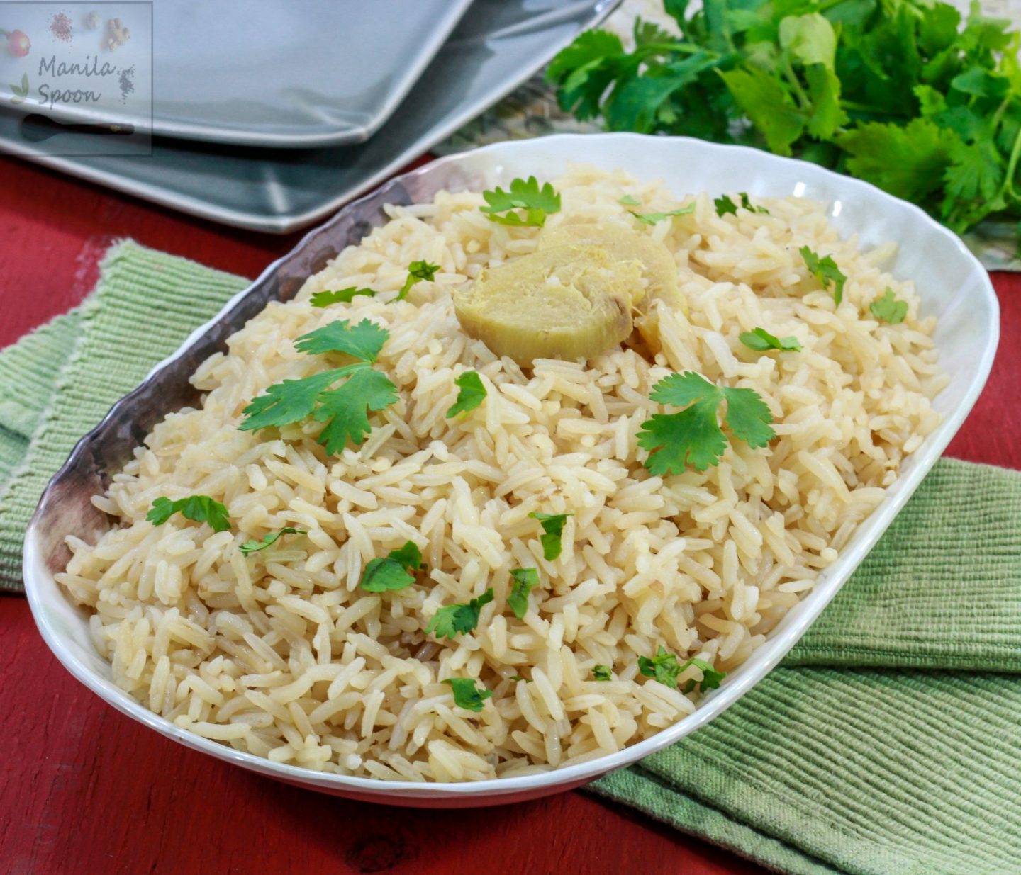  Flavored with garlic and ginger and cooked in chicken broth this easy rice dish is not only tasty it would complement any main dish that calls for rice. Can be made in the stove top or rice cooker for ease and convenience. #rice #garlicrice #gingerrice #comgungtuong 