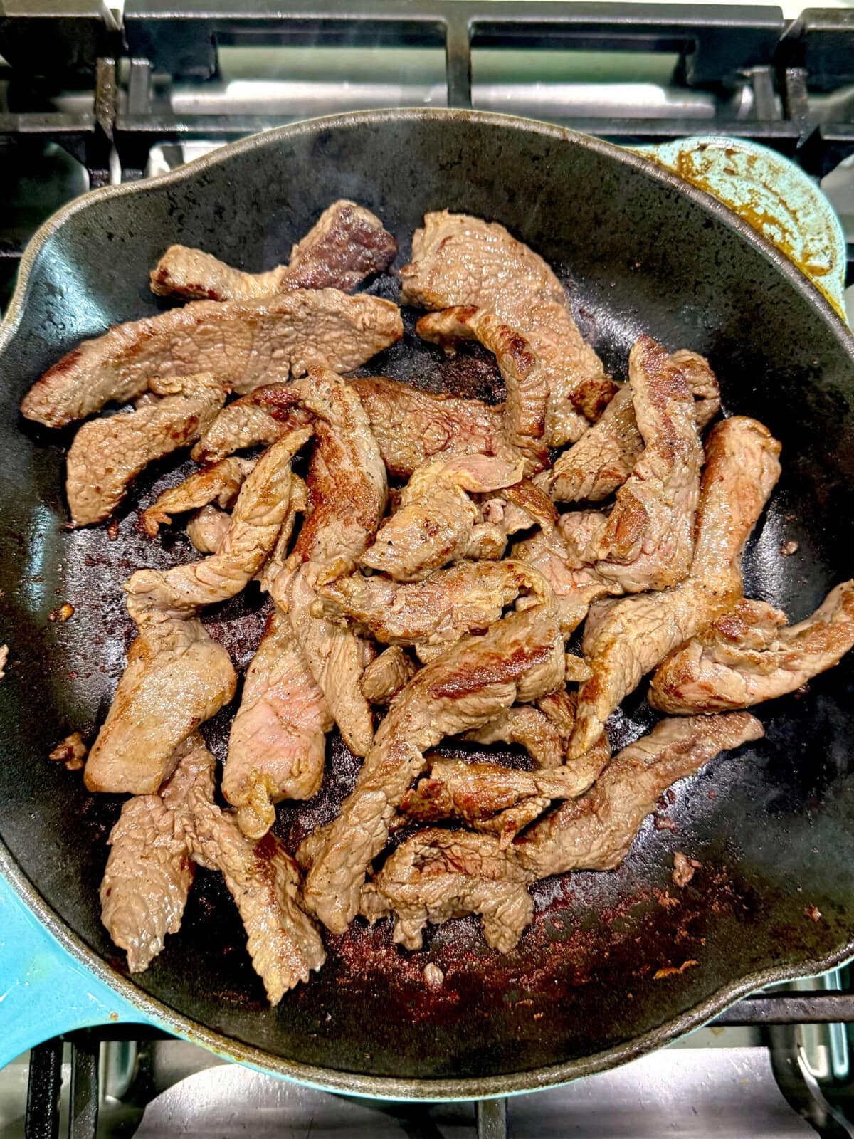 browned steak in the skillet