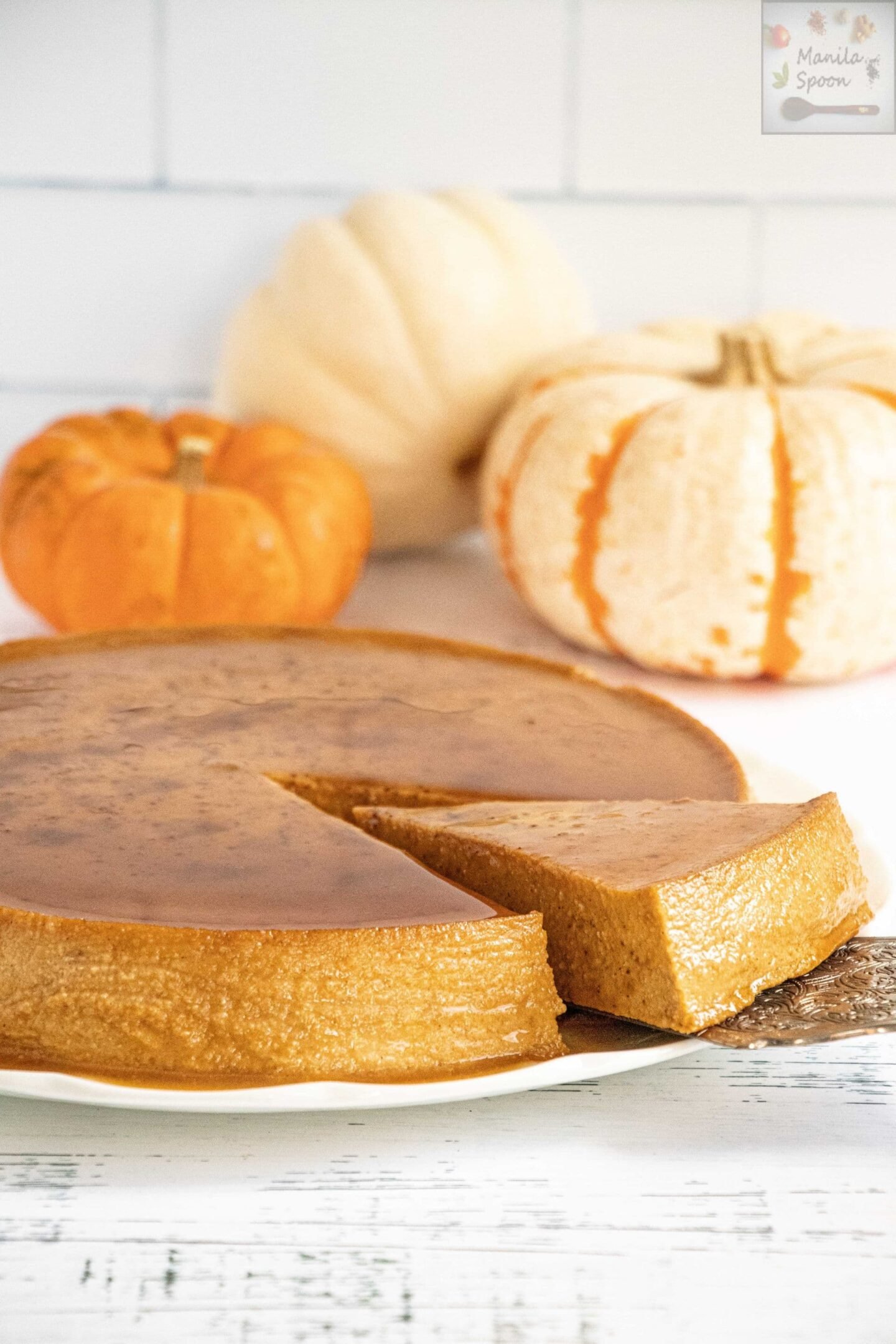This scrumptious Spiced Pumpkin Cheesecake Flan is a delicious custard dessert that's perfectly spiced and great for Thanksgiving or Christmas! A yummy alternative to pumpkin pie and completely gluten-free! Spiced Pumpkin Cheesecake Flan