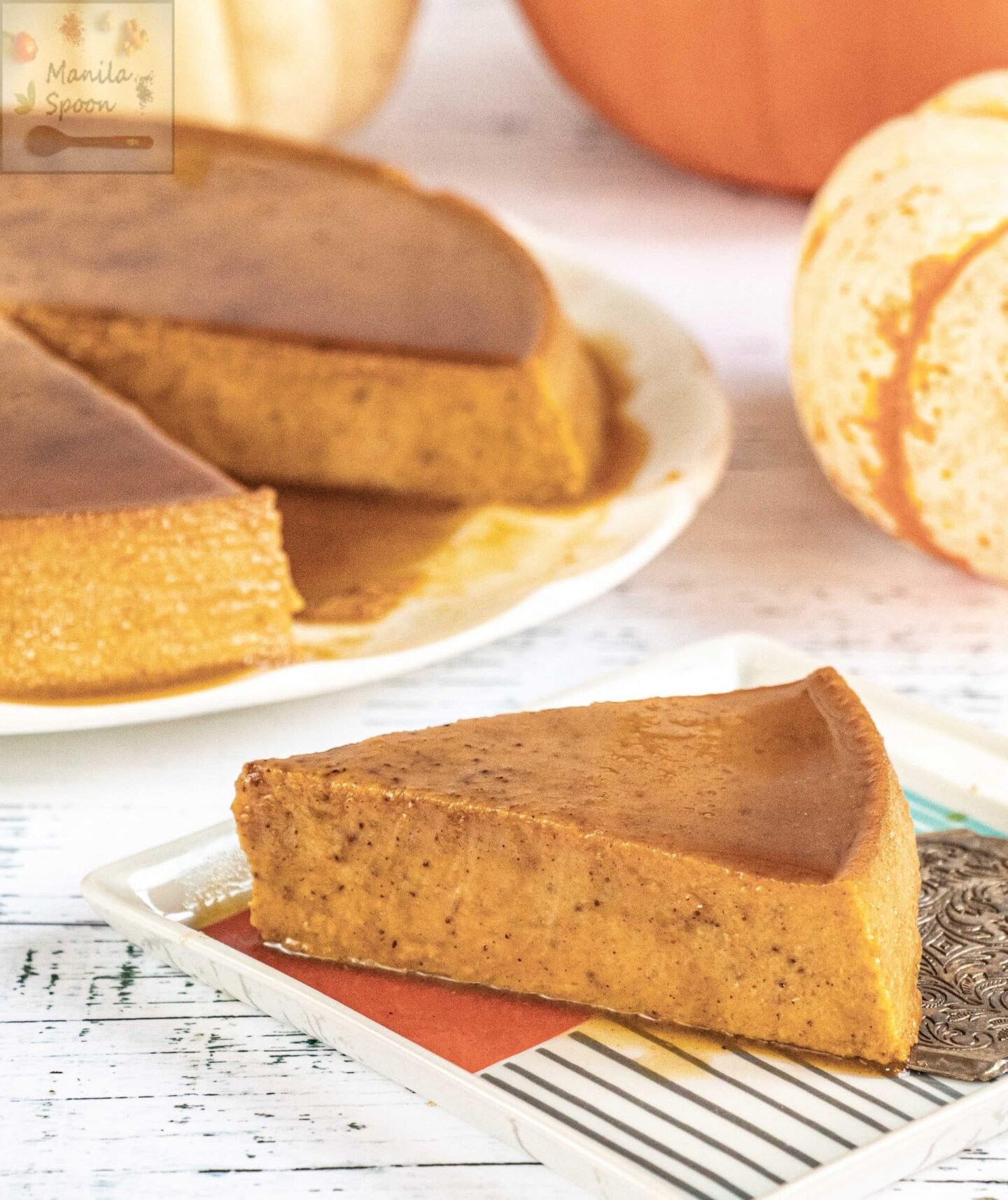 This scrumptious Spiced Pumpkin Cheesecake Flan is a delicious custard dessert that's perfectly spiced and great for Thanksgiving or Christmas! A yummy alternative to pumpkin pie and completely gluten-free! Spiced Pumpkin Cheesecake Flan