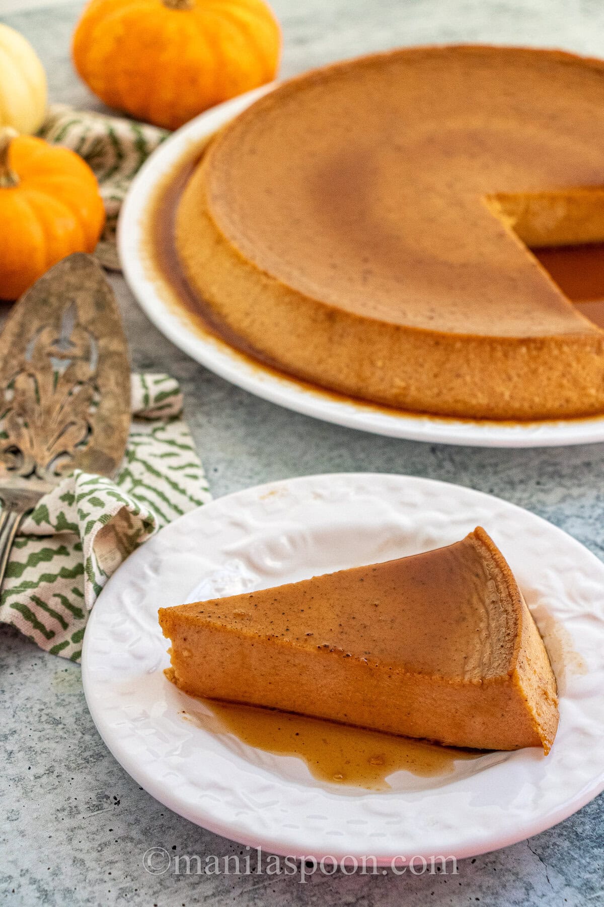 This scrumptious Spiced Pumpkin Cheesecake Flan is a delicious custard dessert that's perfectly spiced and great for Thanksgiving or Christmas! A yummy alternative to pumpkin pie and completely gluten-free! Spiced Pumpkin Cheesecake Flan
