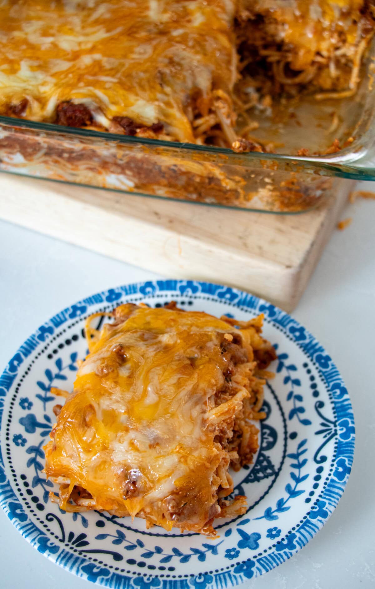 This baked spaghetti dish is so tasty and always a huge hit! With a combo of ground beef and Italian sausage plus herbs all simmered in a perfectly seasoned tomato sauce plus cream cheese mixture in between layers of pasta, your tastebuds are in for a treat. When company’s coming and I want easy but delicious comfort food, I always rely on this easy and creamy Million Dollar Spaghetti. Million Dollar Baked Spaghetti | Easy Make-Ahead Comfort Food