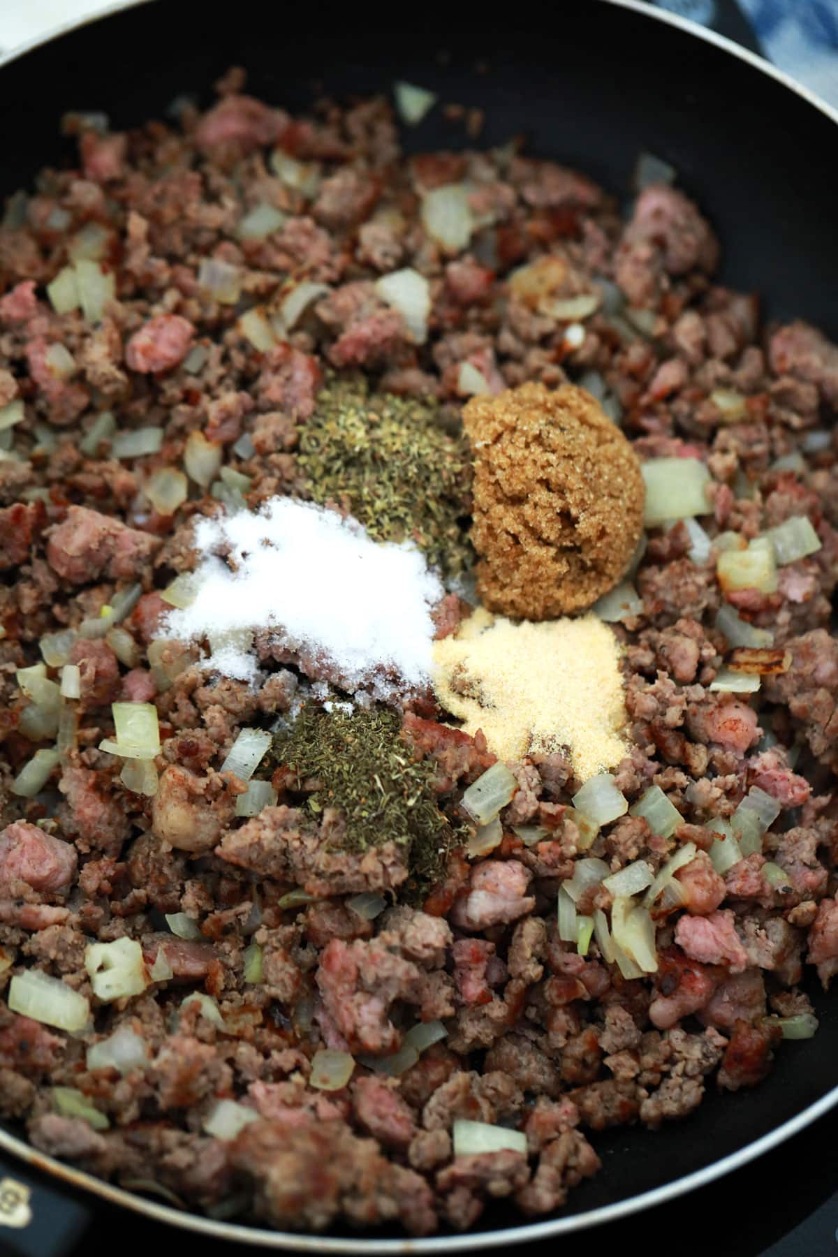 Stir in the salt, brown sugar, garlic powder, dried thyme or Italian seasoning, spaghetti, and tomato sauce.