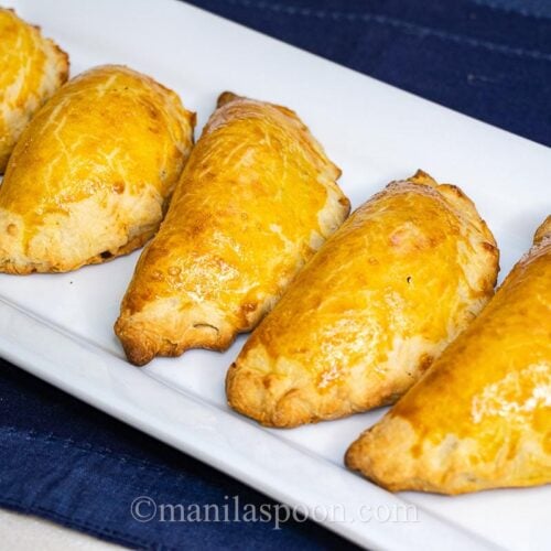 Filipino beef empanadas with a buttery, flaky crust and tasty beef filling with potatoes, carrots, and raisins for that perfect sweet and savory flavor combination.