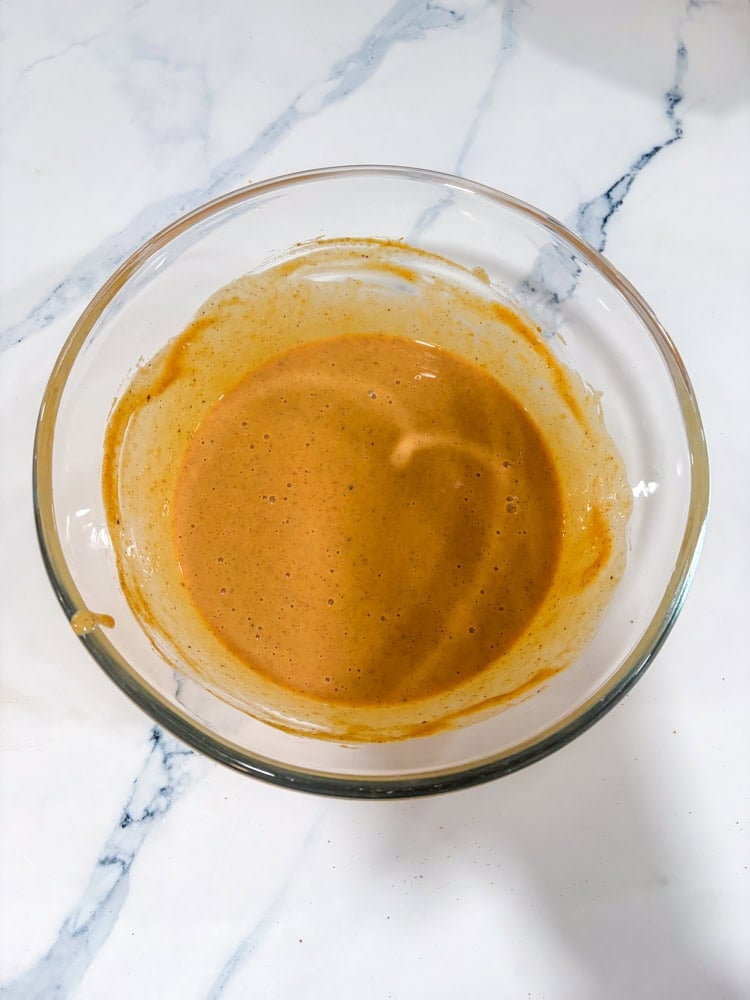 Whisk condensed milk, pumpkin, pumpkin pie spice, and a pinch of salt until smooth.