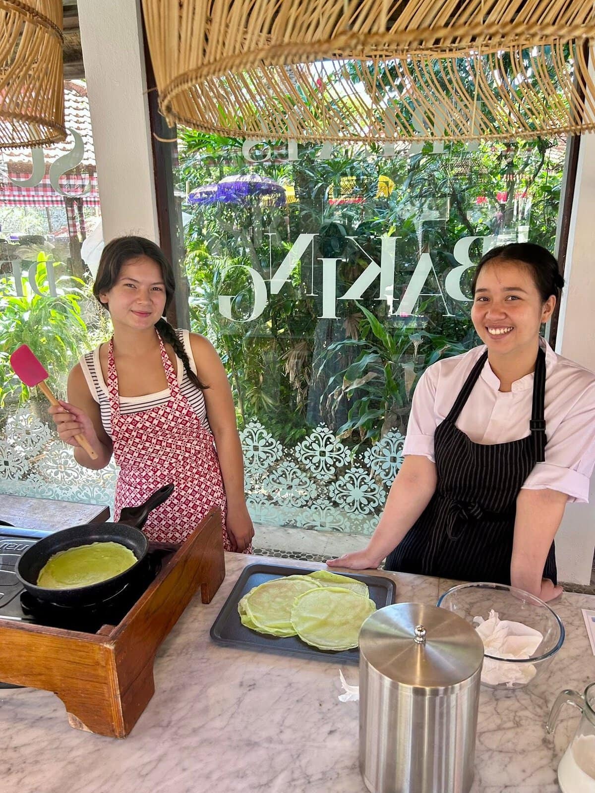 Learning how to cook Indonesian Green Coconut Pancakes