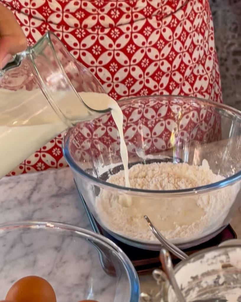 adding milk to flour mixture