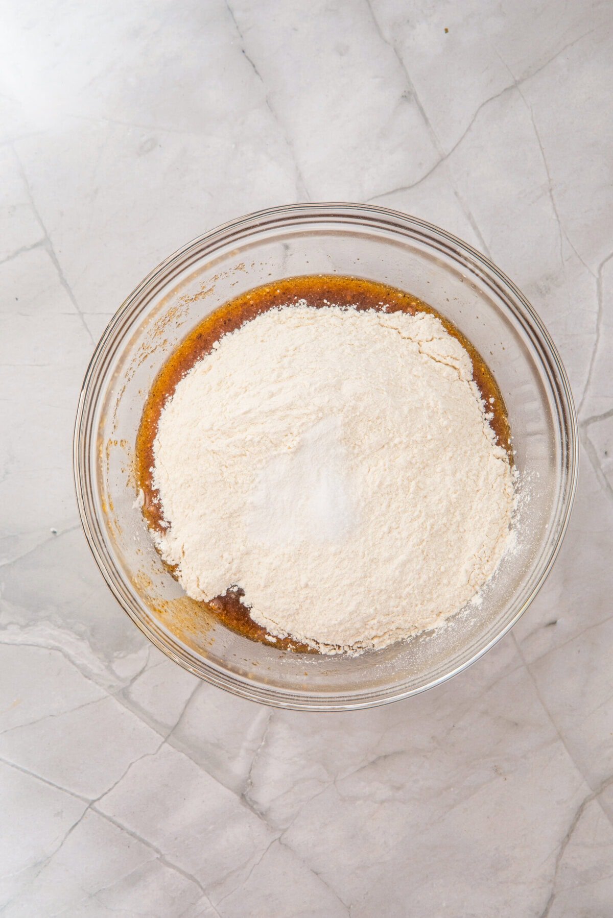 Add flour, salt, and baking powder to the wet mixture.